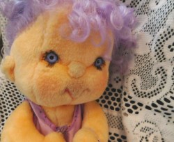 huggums purple face